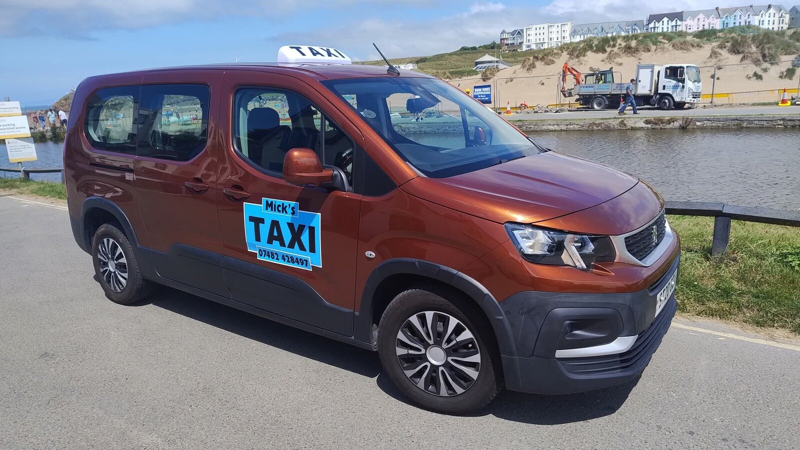 Mick's Taxi car on the Bude seafront